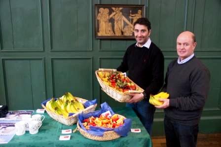 Andreas Georghiou and his fruit display, with Torin Douglas